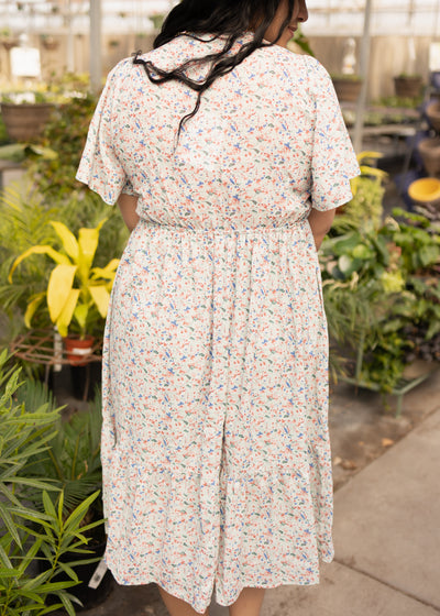 Back view of a mint floral dress