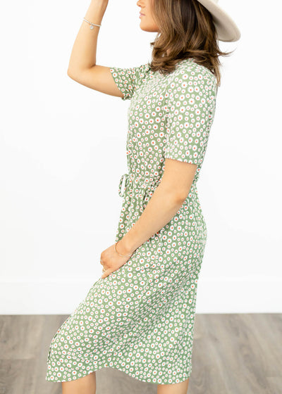 Side view of a olive floral dress