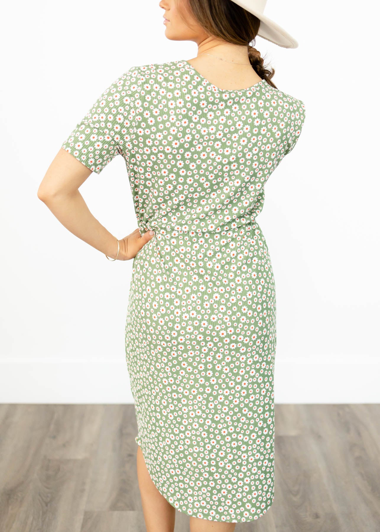 Back view of a olive floral dress