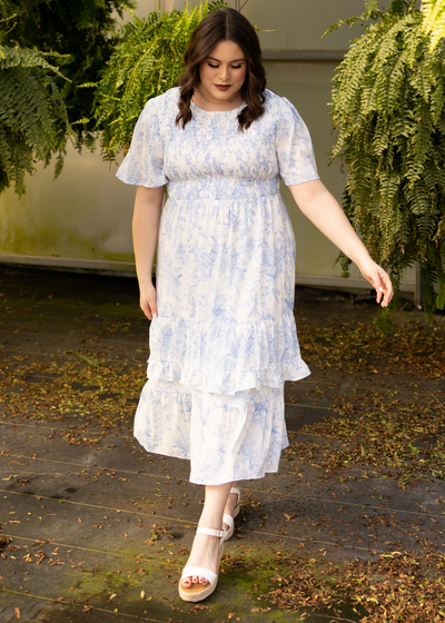 Short sleeve plus size blue dress with a ruffle on the skirt