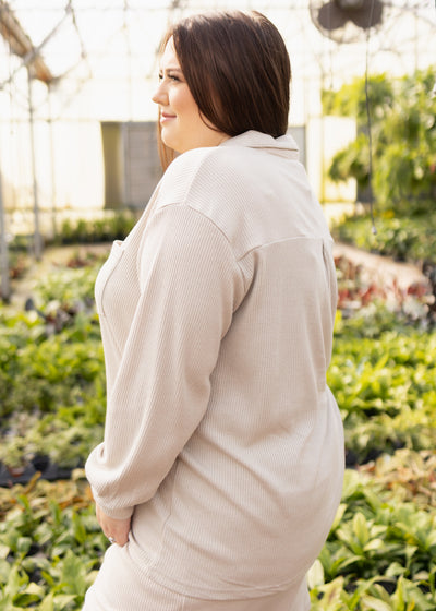Side view of a taupe top