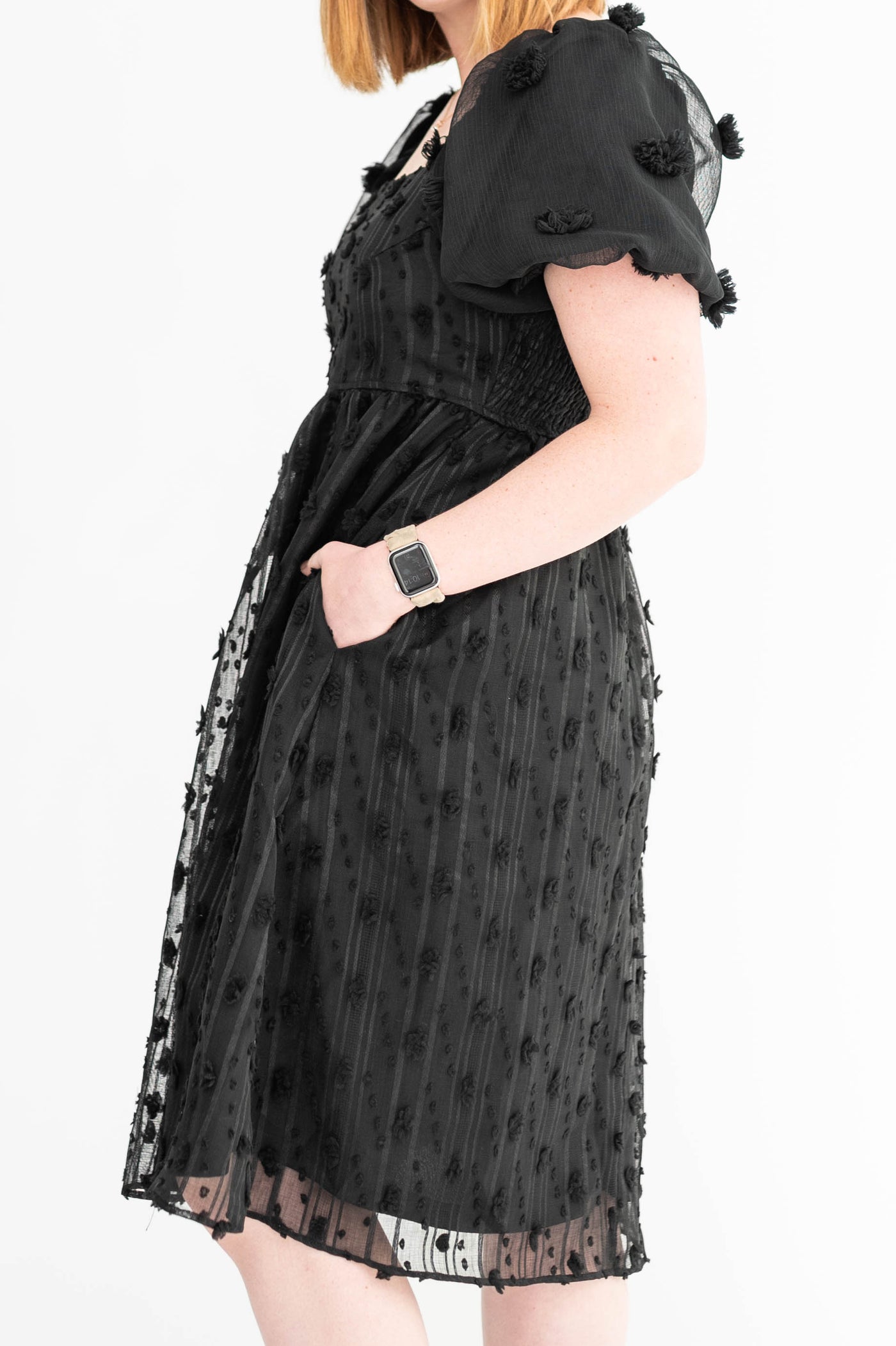 Side view of a medium black dress