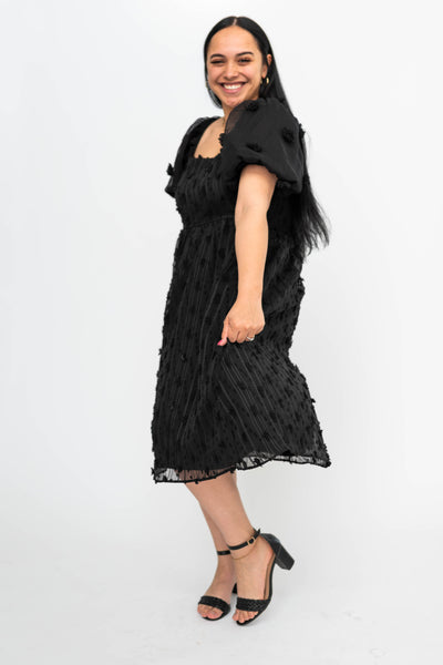 Short sleeve large black dress with puff sleeves