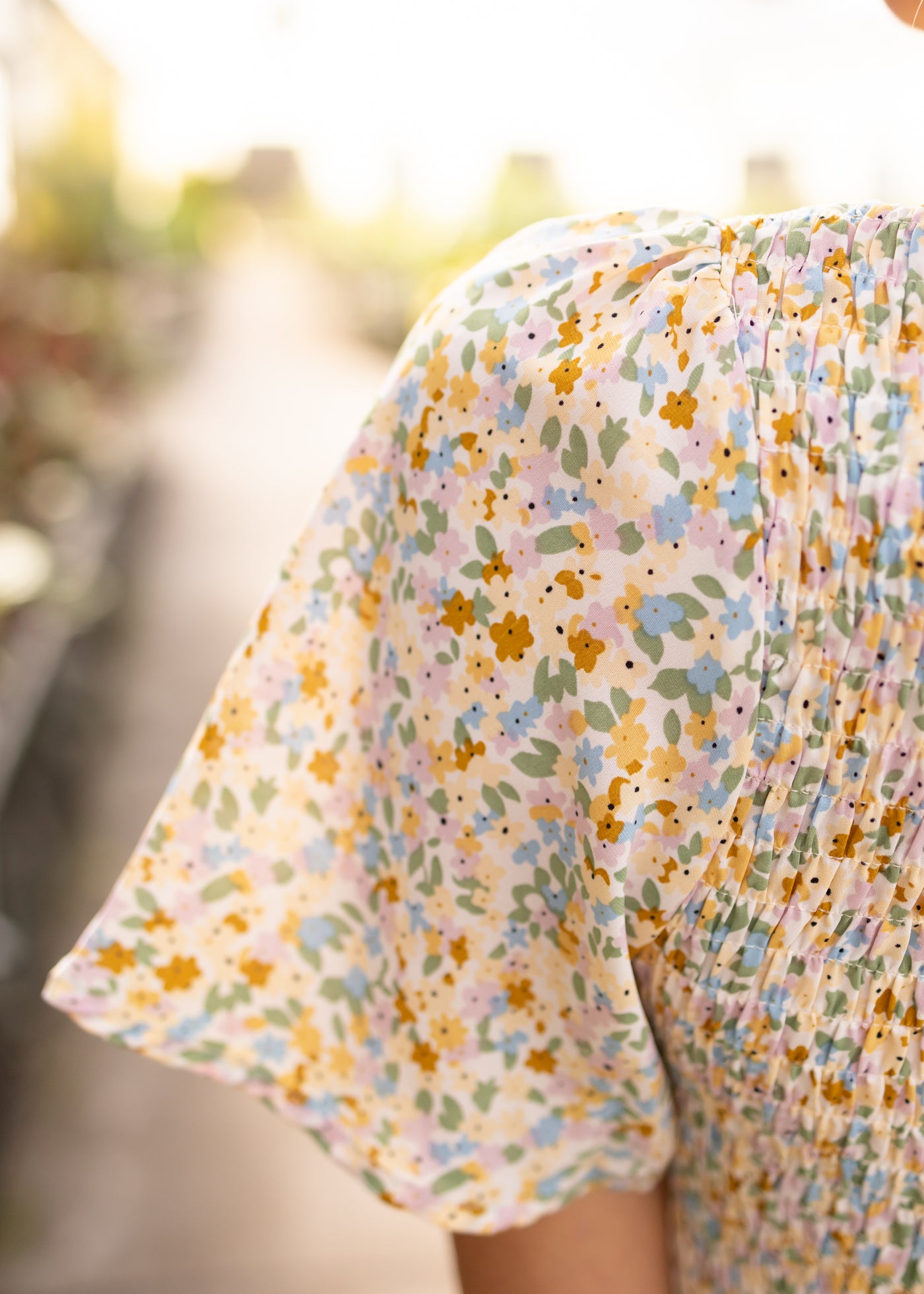 Sleeve of a floral dress