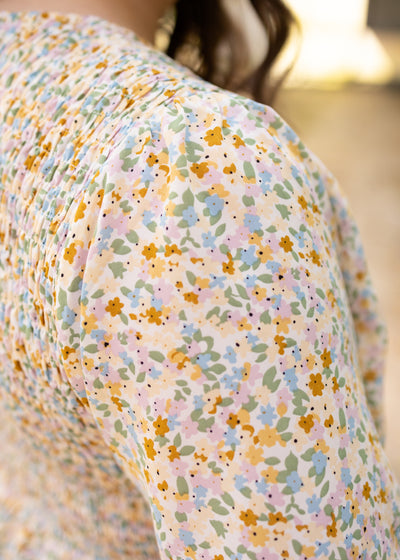 Sleeve of a plus size floral dress