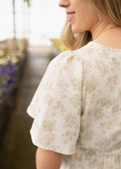 Short sleeve of a sage floral dress