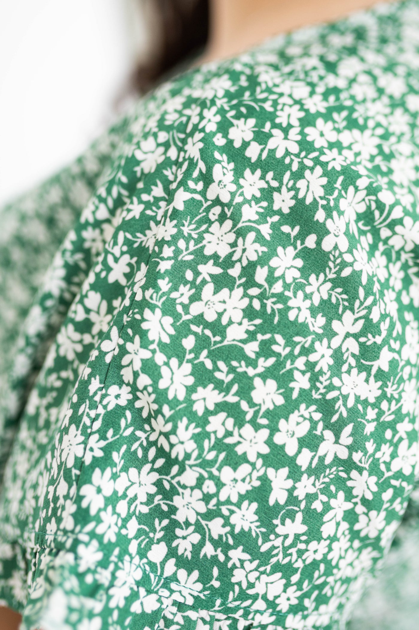 Fabric print of the green floral dress