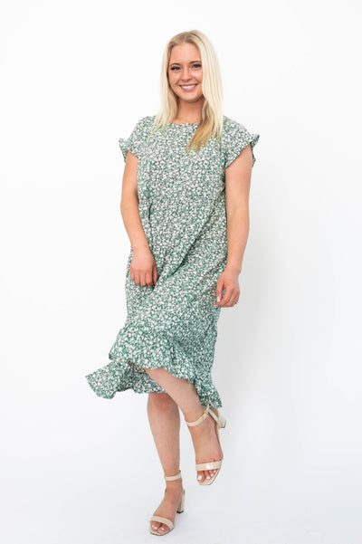 Short sleeve green floral dress with ruffle at the hem