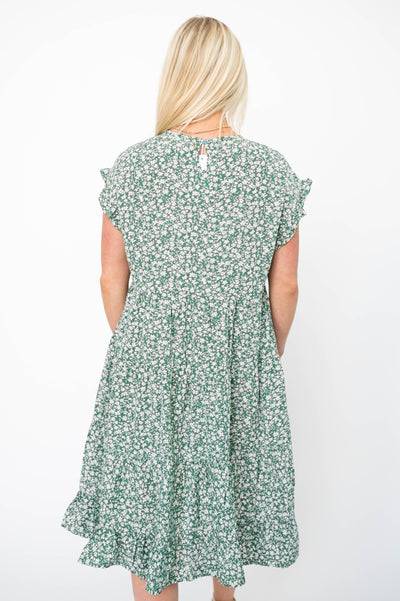 Back view of a green floral dress