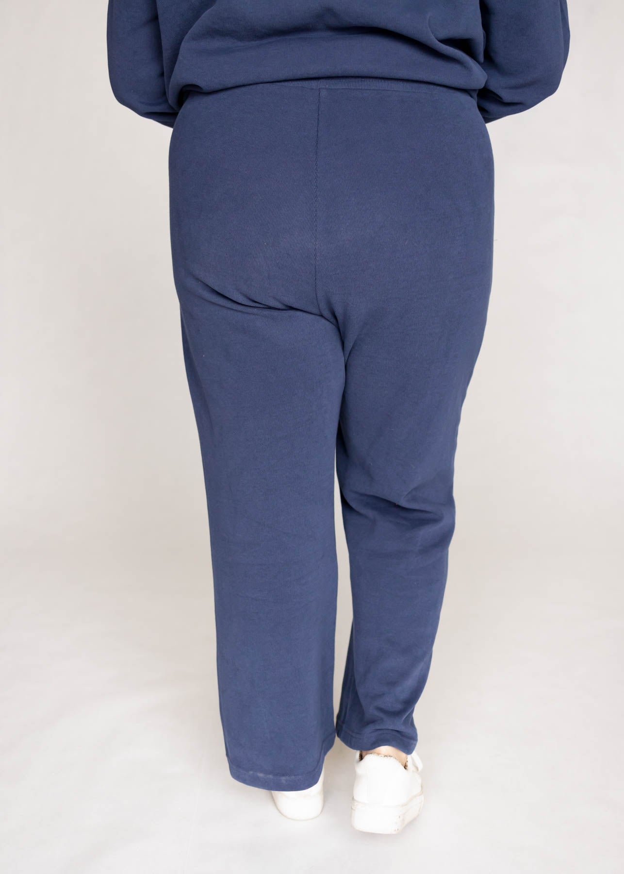 Back view of Plus size dark blue pants