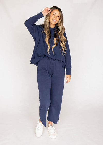 Long sleeve dark navy top with a hood