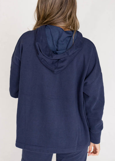 Back view of a dark navy top