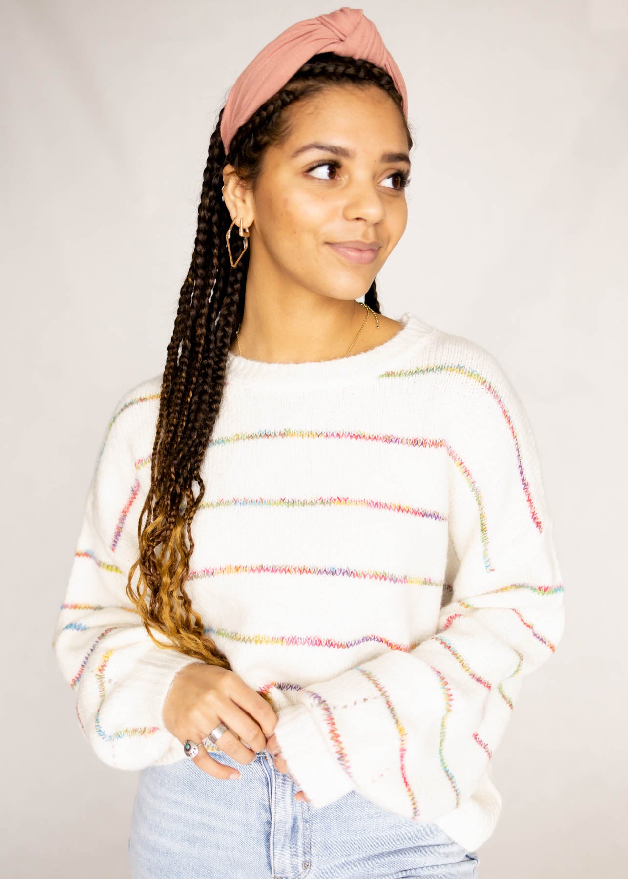 Small ivory sweater with rainbow stripes
