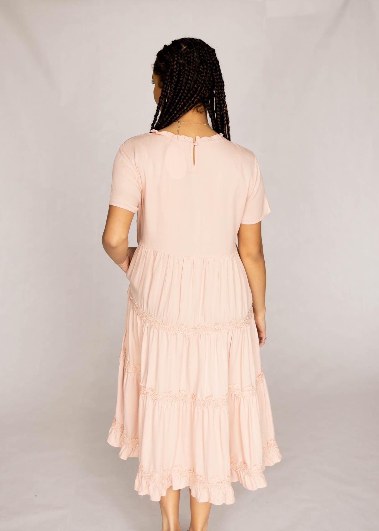 Back view of a blush dress