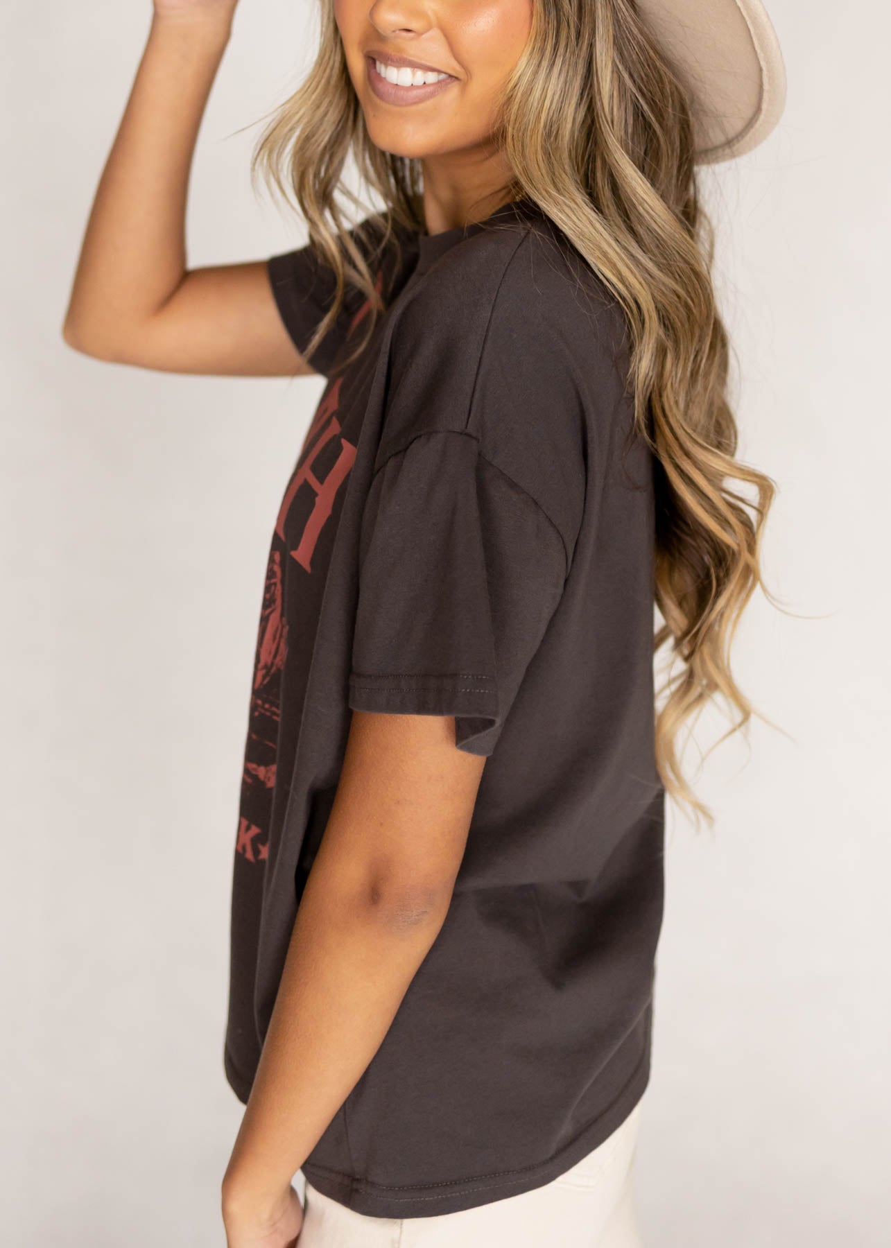 Side view of a charcoal tee