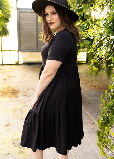 Side view of a plus size black dress
