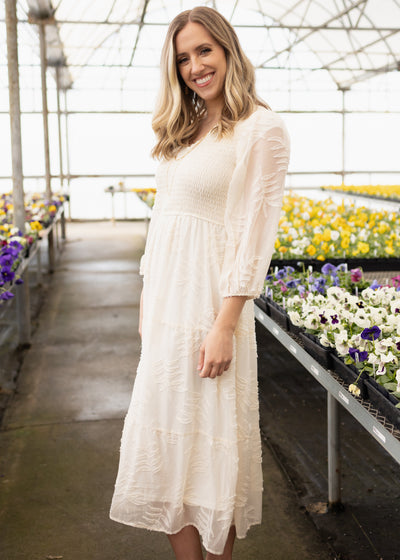 Side view of a cream dress