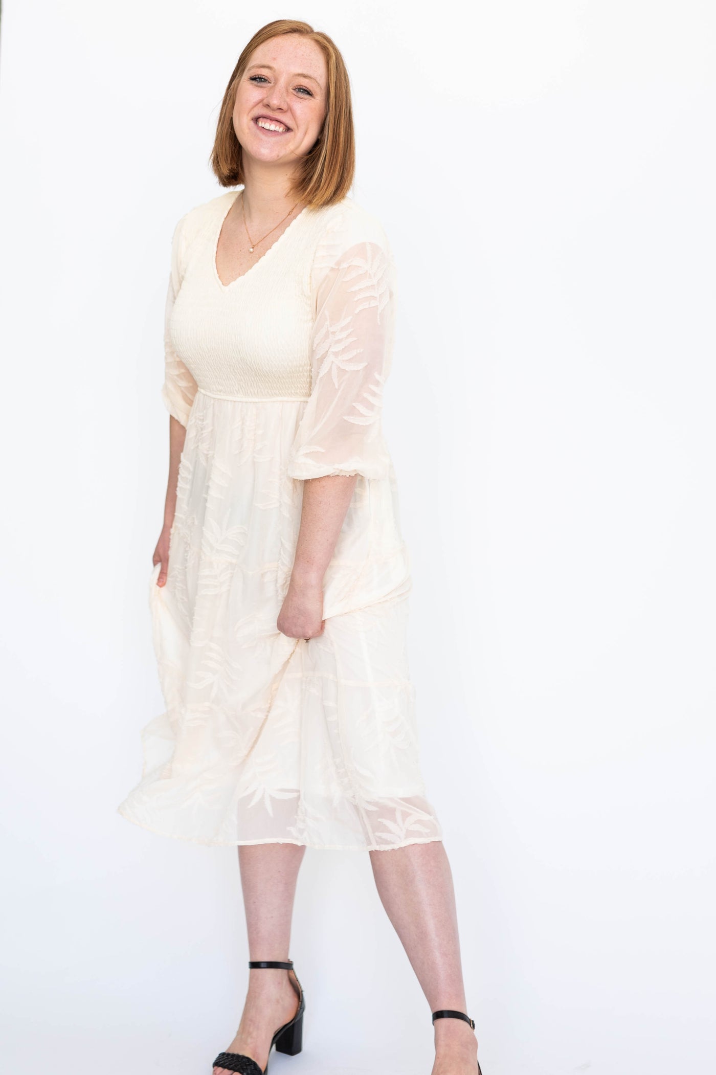 Short sleeve cream dress with sheer sleeves