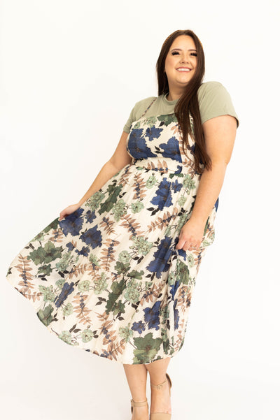 Plus size cream floral dress with smocked bodice