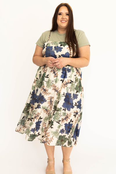 Front view of a cream floral dress with skinny straps