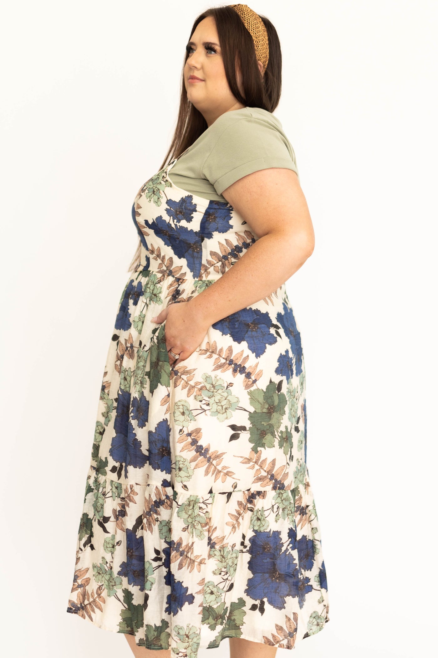 Side view of a cream floral dress