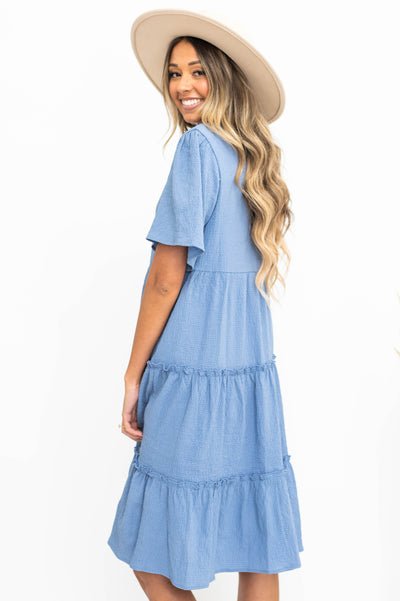 Side view of a blue tiered dress