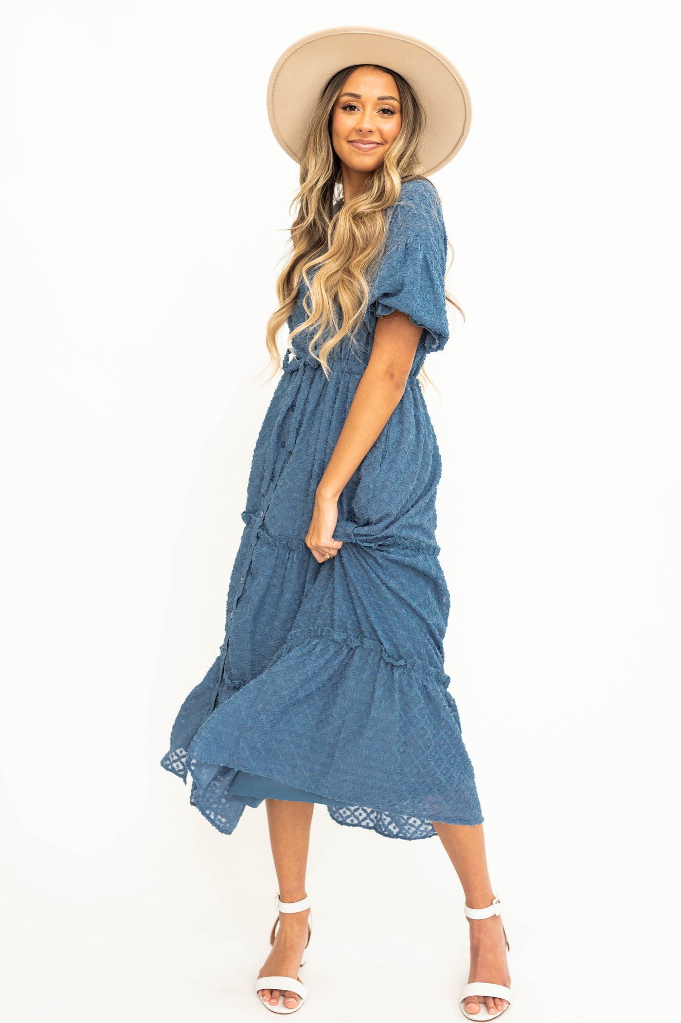 Short sleeve denim blue dress with tiered skirt and ties at the waist