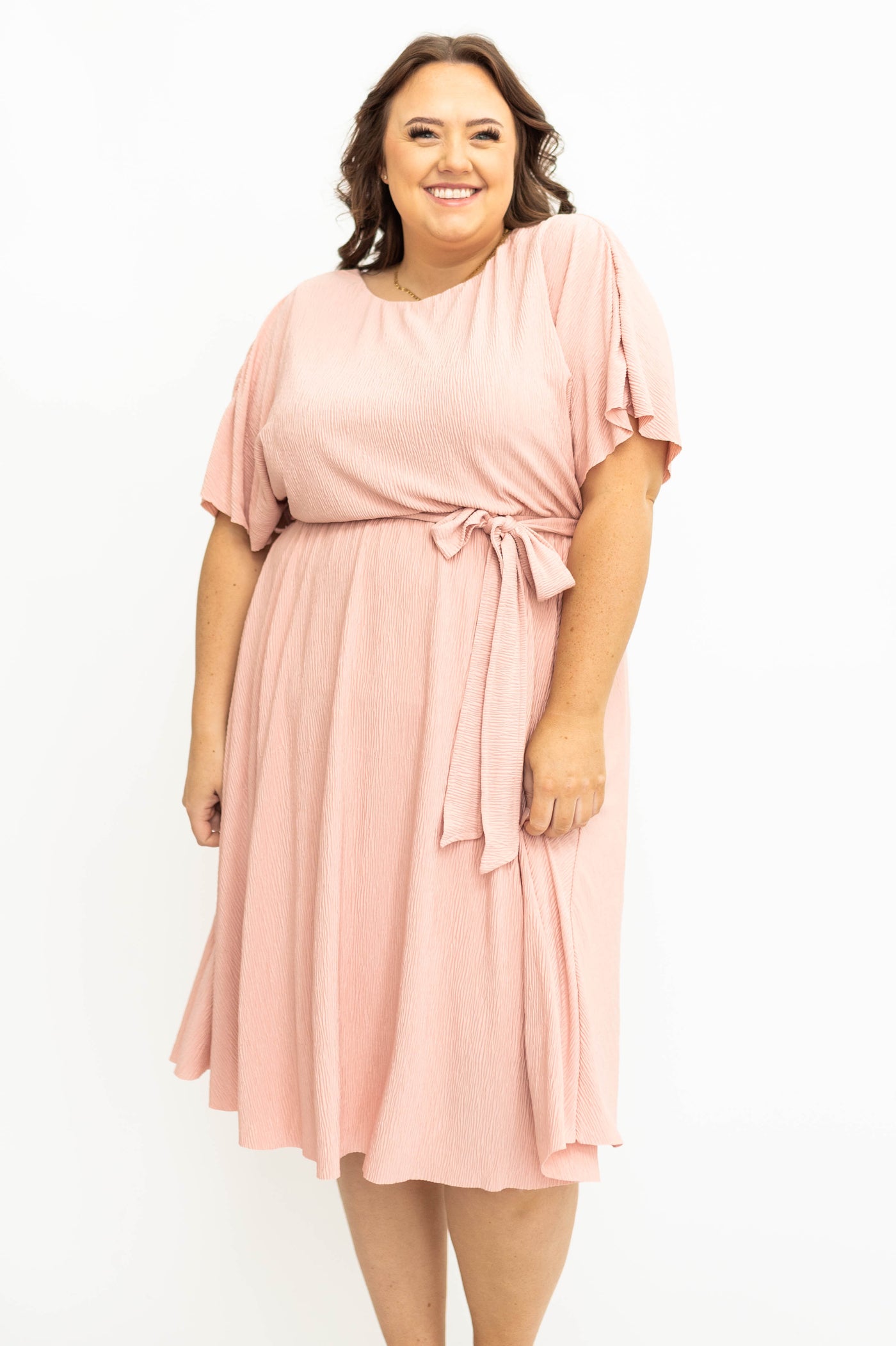 Short sleeve pink dress in a plus size