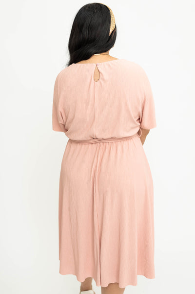 Back view of a large pink dress