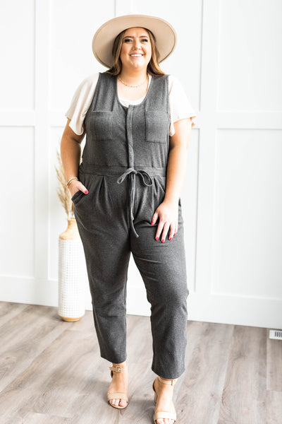 Plus size charcoal jumpsuit with front pockets