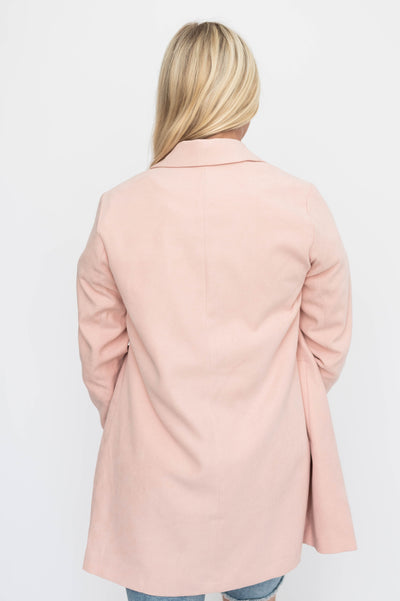 Back view of a blush blazer