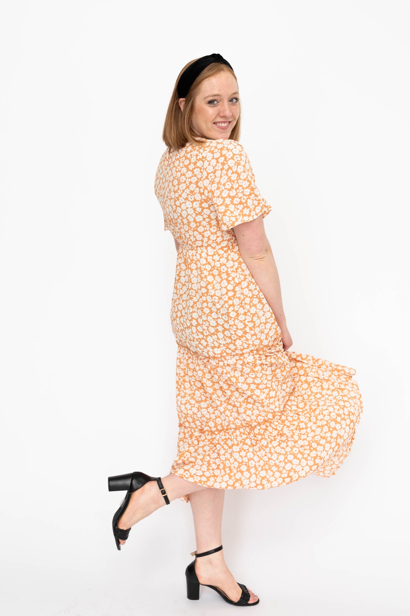 Side view of a apricot dress