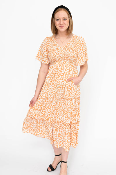 Short sleeve apricot dress with a v-neck
