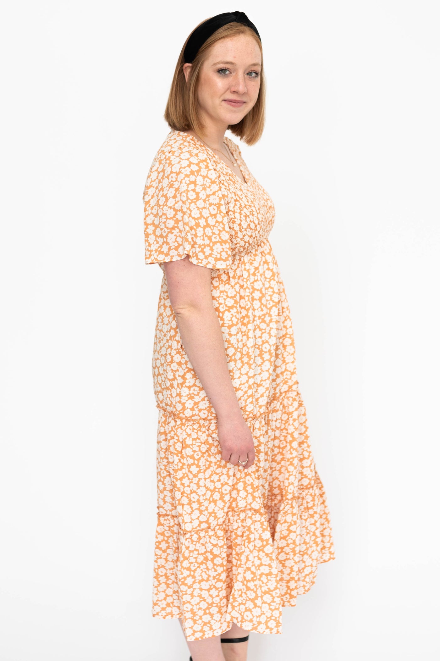 Side view of a apricot dress