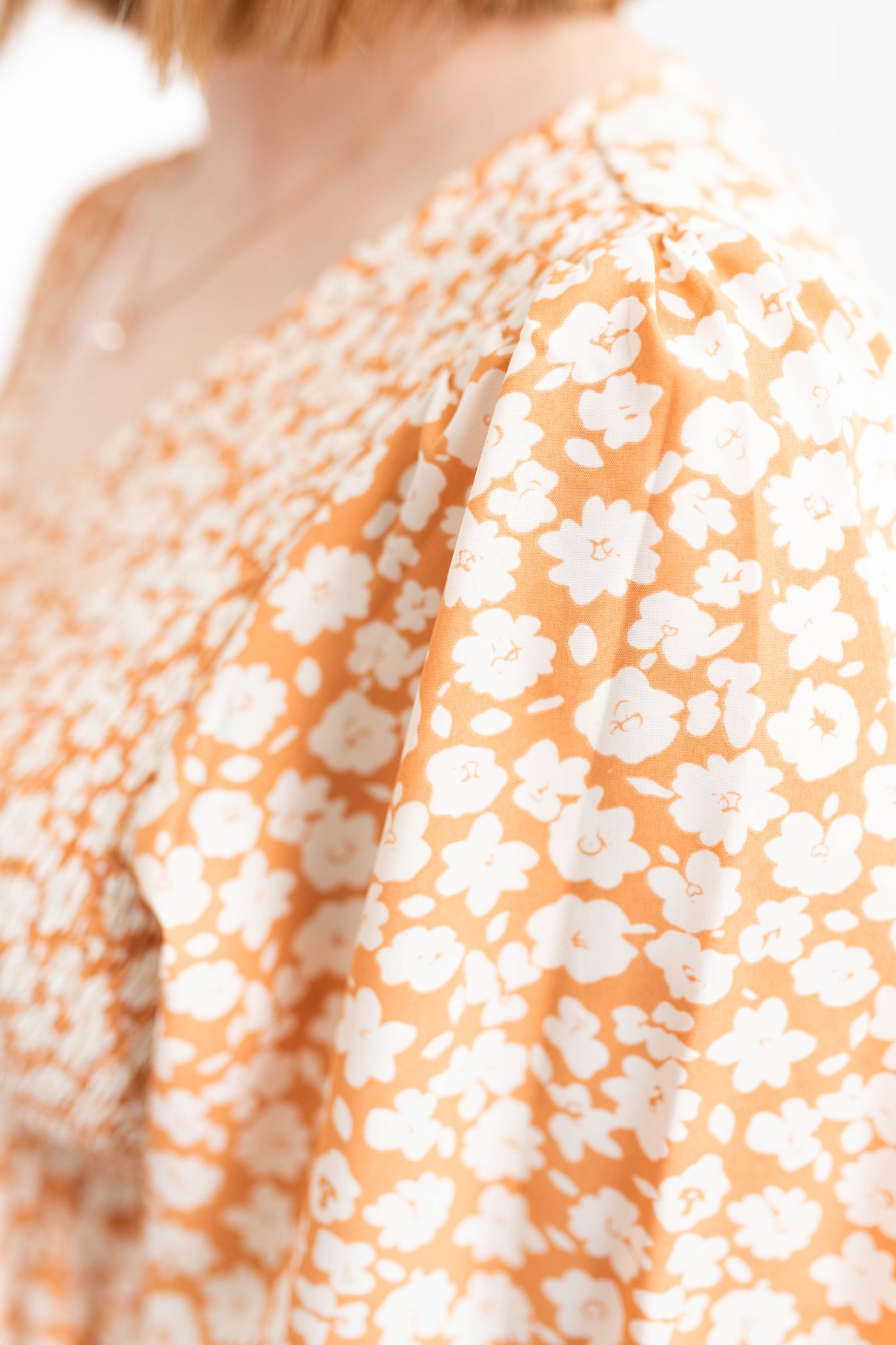 Fabric pattern of a apricot dress