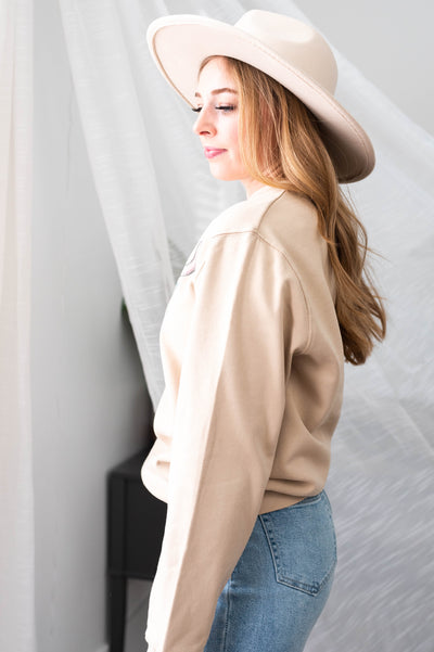 Side view of a sand sweatshirt