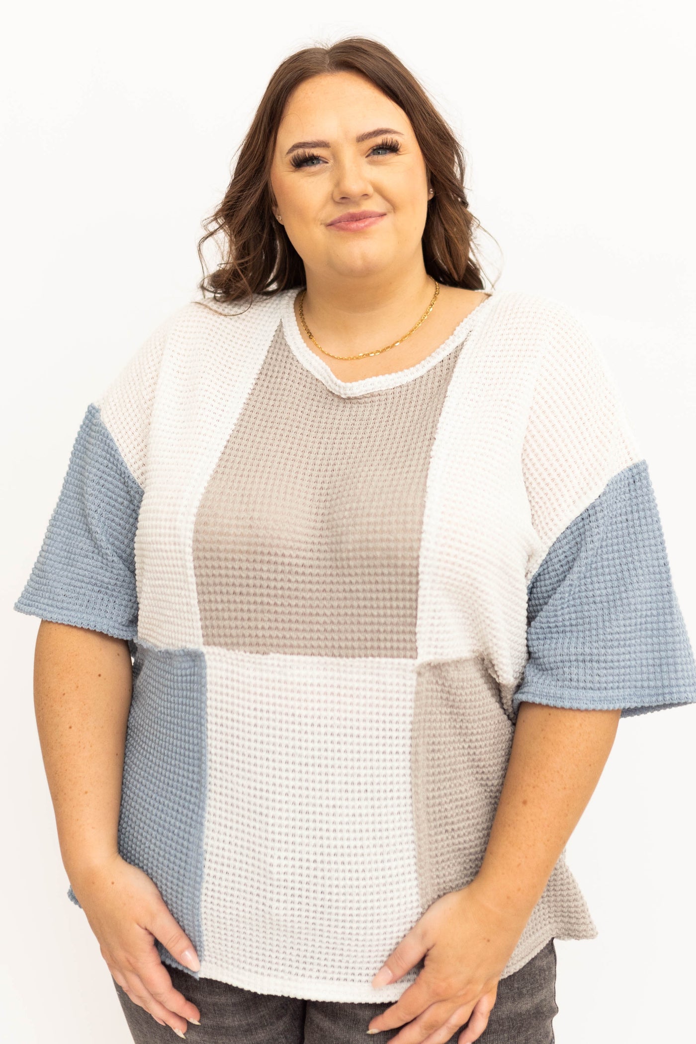 Plus size blue knit top with tan squares