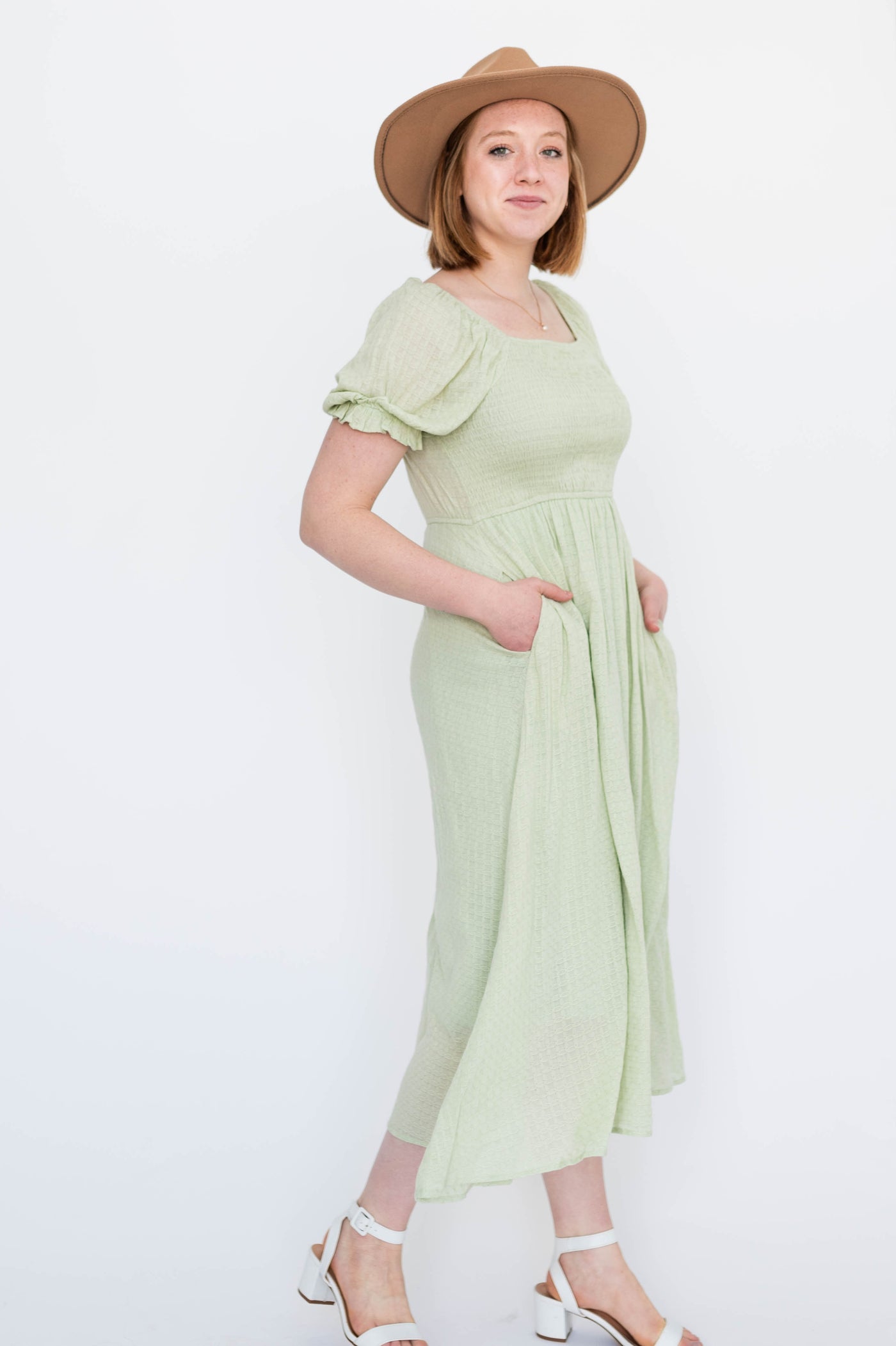 Short sleeve sage dress with smocked bodice and pockets