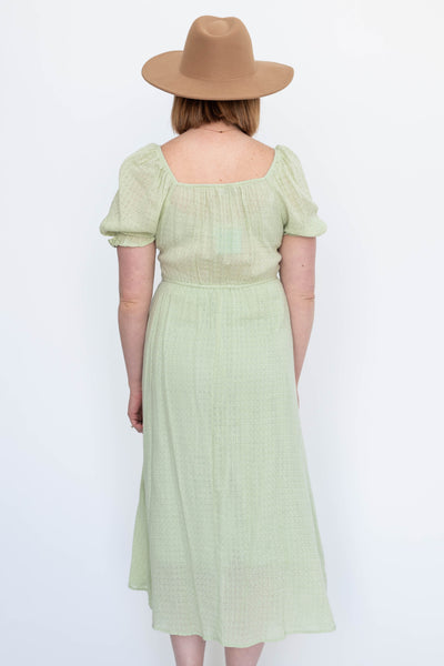 Back view of a sage dress