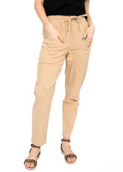 Khaki pants with distressed knee