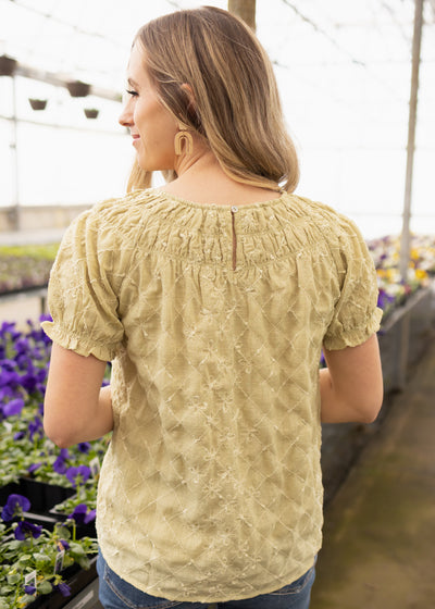 Back view of a sage top
