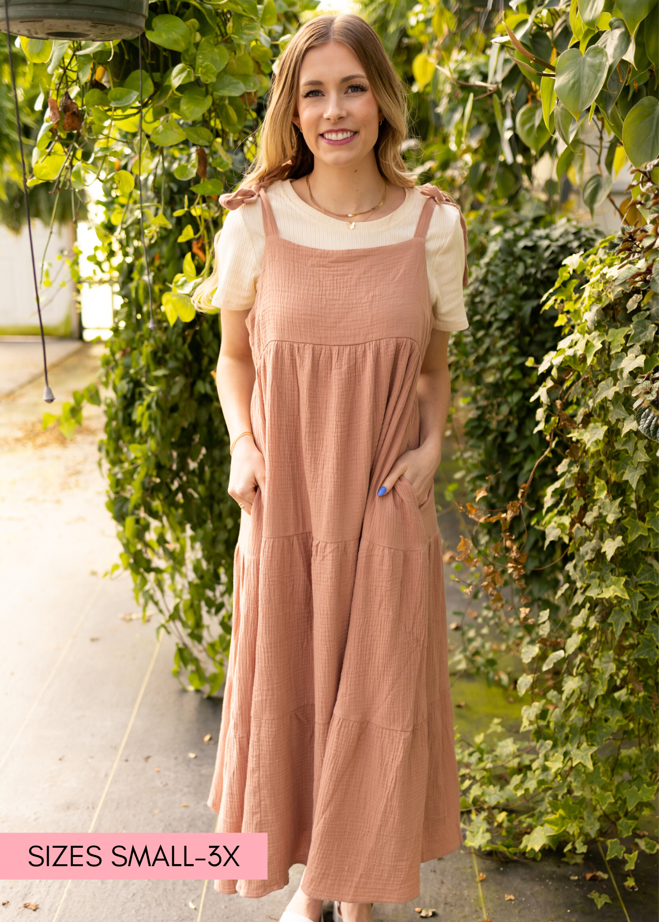 Clay jumper dress with pocket and ties at the shoulders