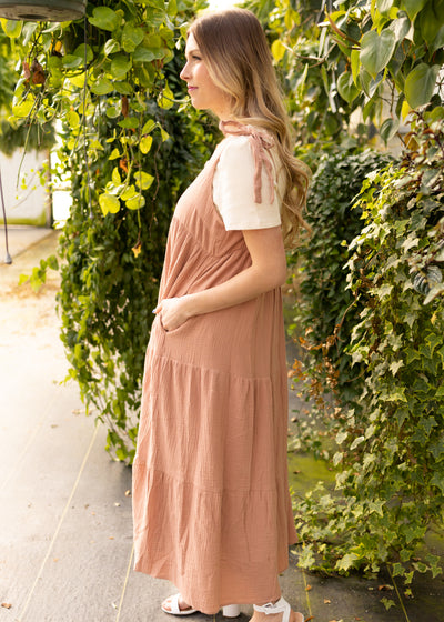 Side view of a clay jumper dress