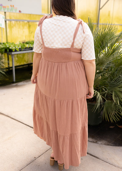 Back view of a plus size clay jumper dress