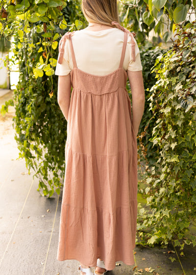 Back view of a clay jumper dress