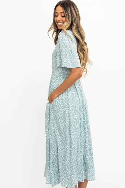 Side view of a sage floral dress