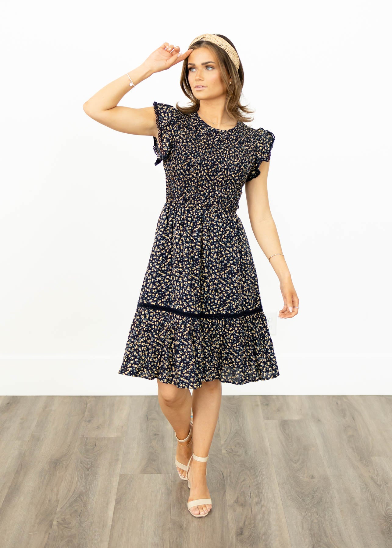 Short sleeve navy floral dress with ruffle sleeves
