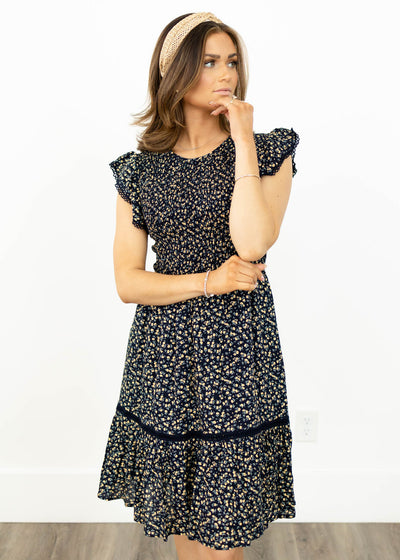 Navy floral dress with smocked bodice