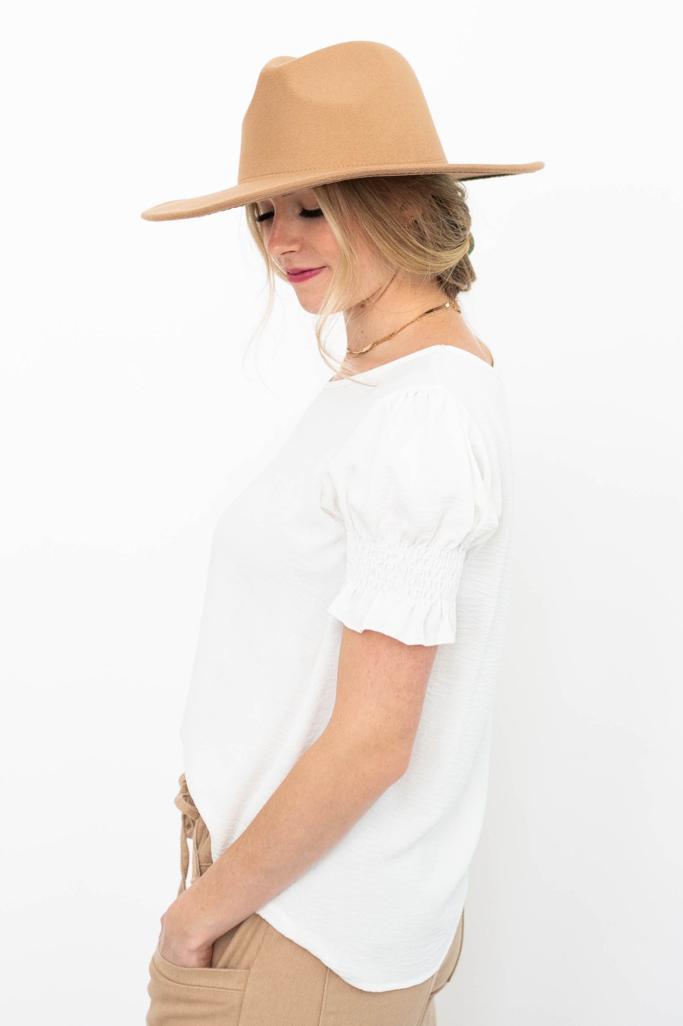 Side view of a short sleeve white top