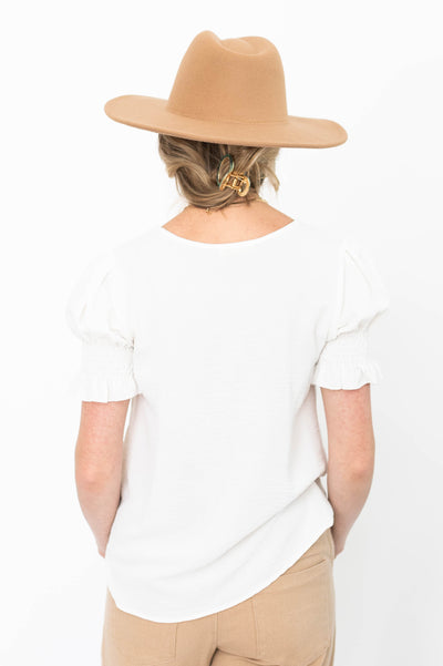 Back view of a short sleeve white top